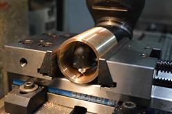 Machining an oil groove in a Bronze bearing.